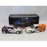 Die-Cast; Three 1/18 scale Model Rally Cars Including "Autoart" (Burns/Reid) Subaru Impreza WRC (