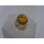 9ct gold and Amber ring,