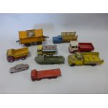 A small collection of nine die-cast vehicles in varying playworn condition to include Dinky, Siku,