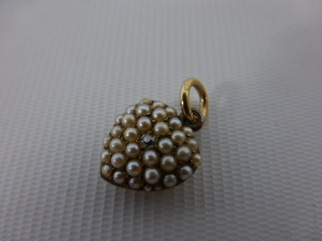 Victorian gold heart shaped pendant set with seed pearls around a central diamond, - Image 2 of 3
