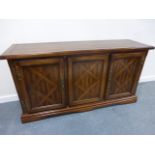 Good quality oak sideboard with diamond inlaid banding and aged detailing to the panelled doors,