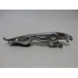 A chromium plated Jaguar car mascot, numbered to base 7'10420'0.