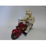 Michelin Man model on a motor bike,