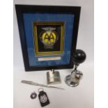 A chromium plated motorcycle or bicycle bulb horn together with a framed display of a 1956 AA badge,
