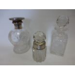 Large cut glass waisted scent bottle with silver collar and replaced tortoiseshell effect centre,