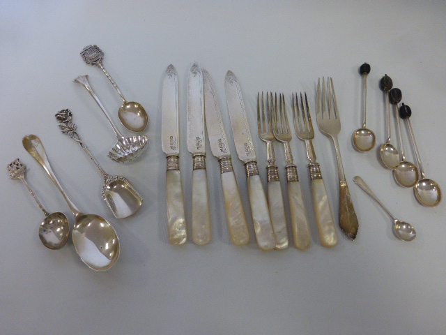 A collection of English and Continental silver to include a Georgian rail tail spoon, marks rubbed,