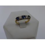 An Edwardian 18ct gold Sapphire and Diamond five stone ring, each diamond measuring approximately 0.