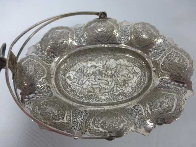 A Middle Eastern silver swing handled dish with bird finial, - Image 2 of 3
