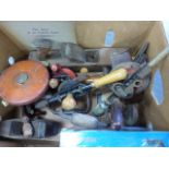 Collection of vintage tools including drills and planes together with a Rabone 30m tape measure