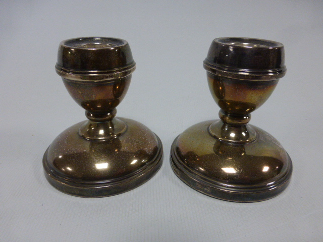 Pair of silver dwarf candlesticks, hallmarked Birmingham 1975/6 by maker John Rose,