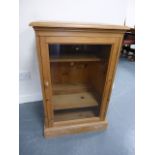 Pine cabinet with single glazed door and lift up top, with two internal shelves, 53.5x45.5x84.