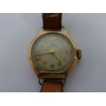 Ladies 9ct gold Record wristwatch with 15jewel Swiss made movement, on leather strap, in working