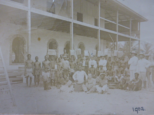 Two early 20th Century group photographs showing Europeans and local people, - Image 3 of 3