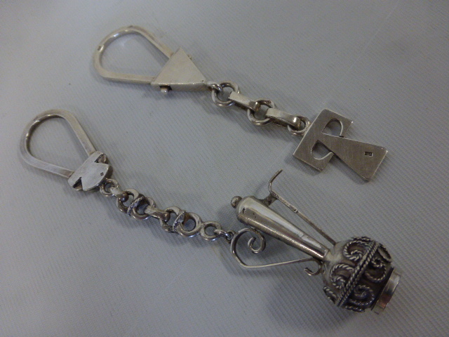 Two Middle Eastern silver key rings, fully hallmarked, 63.