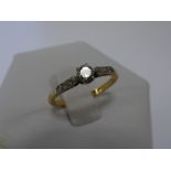 18ct gold Diamond solitaire ring with diamond accents to shoulders,