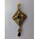 An Art Nouveau 9ct gold pendant set with Amethysts, 4.