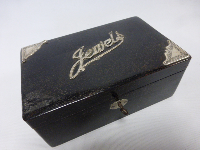 Ebony jewellery box with silver 'Jewels' decoration, hallmarked London 1922,