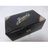 Ebony jewellery box with silver 'Jewels' decoration, hallmarked London 1922,