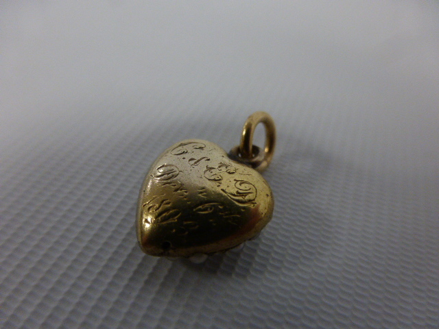 Victorian gold heart shaped pendant set with seed pearls around a central diamond, - Image 3 of 3