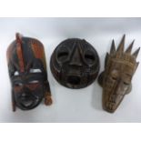 Three African carved masks