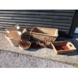 Ten assorted wicker baskets to include a pet carrier
