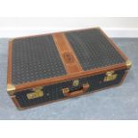 Italian designer Pollini suitcase, leather bound with brass corners, 65.5x42x19.