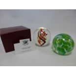 Caithness 'Sorcerer's Apprentice' paperweight and a Royal Crest 'Vulcan' paperweight with box
