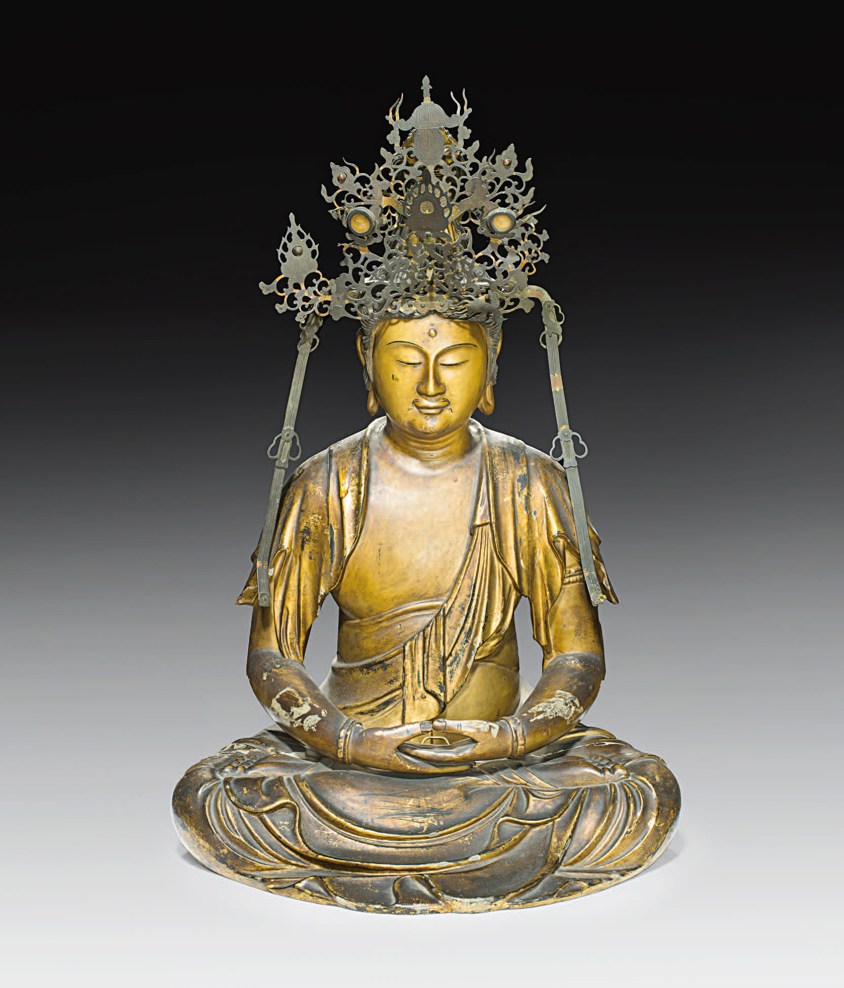 Japan (18. Jh.)
Sitzender Buddha
Holz, geschnitzt und gefasst
H: 57 cm

Experte: Cabinet Portier,