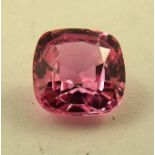 A PINK SYNTHETIC CUT LOOSE GEM STONE