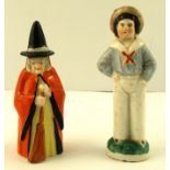 AN EARLY 20TH CENTURY ROYAL WORCESTER CANDLE SNUFFER IN THE FORM OF A WITCH, puce factory mark