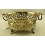 ASPREY, LONDON A 20TH CENTURY SILVER BASKET with pierced decoration, fitted two hinged handles,