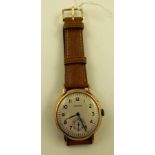 A 1950's LONGINES GENTLEMAN'S 18CT GOLD MECHANICAL WRIST WATCH having 17 jewel mechanism, faced with