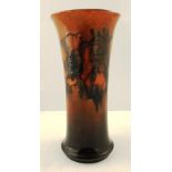 A MOORCROFT VASE of tapering cylindrical form, tube lined floral decoration, impressed factory marks