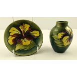 WILLIAM MOORCROFT AN OVOID SHAPED EARTHENWARE VASE, 12cm high, and a PIN DISH, 9cm, paper QM back