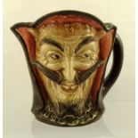 A ROYAL DOULTON MEPHISTOPHELES CHARACTER JUG, motto below "When the devil was sick the devil a saint