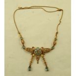 AN EDWARDIAN STYLE GOLD COLOURED METAL SEED PEARL AND POSSIBLY AQUAMARINE NECKLET having filigree