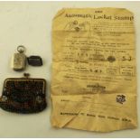 A NICKEL FINISHED "AUTOMATIC LOCKET STAMP", a spring loaded contrivance with original instructions