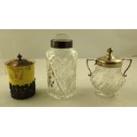 A SILVER RIMMED CUT LEAD CRYSTAL DRESSING TABLE JAR with hermetic glass stopper, another two handled