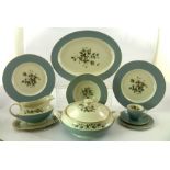 A ROYAL DOULTON BONE CHINA DINNER SERVICE "ROSE ELEGANS" comprising twelve dessert/soup bowls,