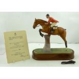 A ROYAL WORCESTER BONE CHINA MODEL "Foxhunter & Lt. Col. H.M. Llewellyn CBE" horse and rider