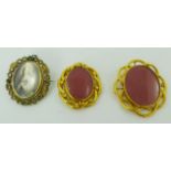 TWO LATE VICTORIAN/EDWARDIAN PINCHBECK LOCKET BROOCHES, each of tubular wrapped construction with an