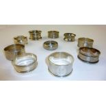 AN ASSORTMENT OF TEN VARIOUS SILVER NAPKIN RINGS to include bright cut bead and other patterns,