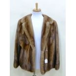 A LIGHT BROWN MINK BOLERO/SHORT JACKET, approximately size 14