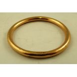 A 9CT GOLD PLAIN SLAVE BANGLE, 10g