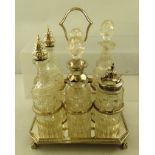 A SILVER PLATED SIX-BOTTLE CRUET of Georgian design