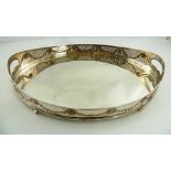 A LATE 19TH CENTURY SILVER PLATED ON COPPER TWIN-HANDLED OVAL TRAY, with pierced galleried sides and