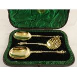 JAMES WAKELY & FRANK CLARKE WHEELER A LATE 19TH CENTURY SILVER GILT FRUIT SERVING SET, comprising