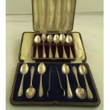 C W FLETCHER LTD A PART SET OF FIVE SILVER COFFEE SPOONS and matching TONGS, Sheffield 1921, cased