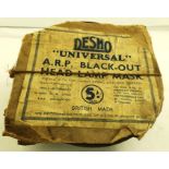 A "DESMO" UNIVERSAL A.R.P. BLACK-OUT HEAD LAMP MASK in original wrapping