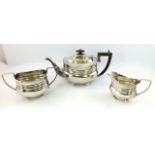 ROBERT FEAD MOSLEY & CO AN EDWARDIAN THREE PIECE SILVER TEA SET of Georgian design, plain waisted